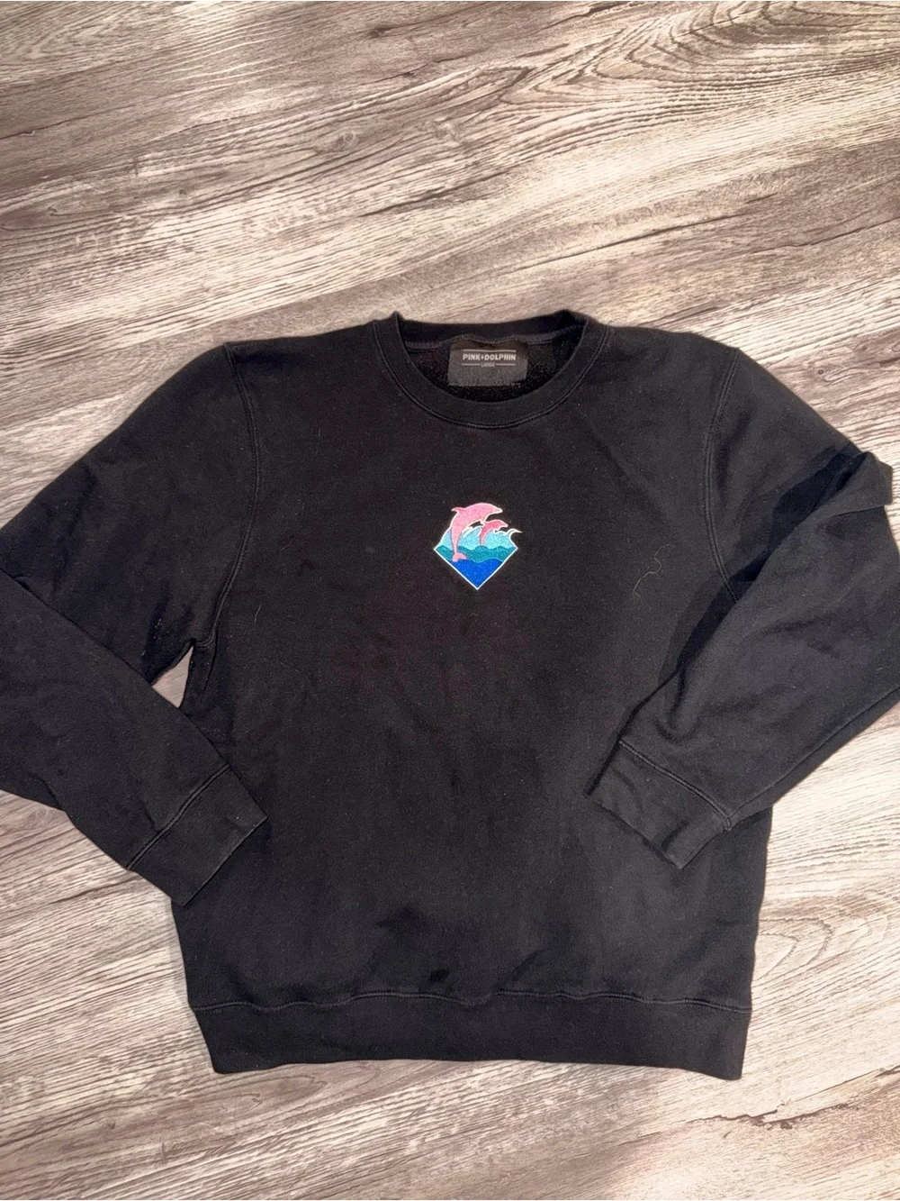 Pink Dolphin Black Crewneck with Blue Wave Dolphin Patch